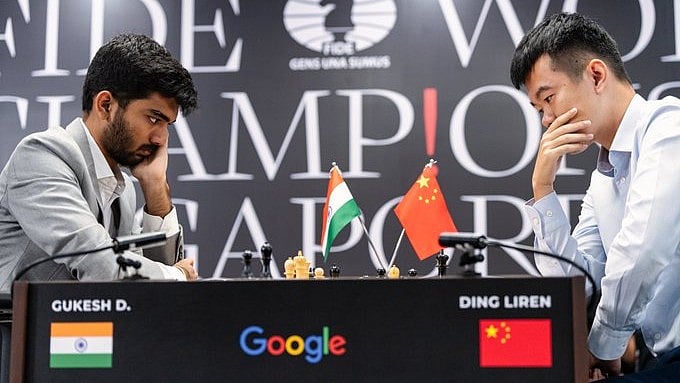 X/FIDE : D Gukesh and Ding Liren in action during World Chess  Championship in Singapore. 