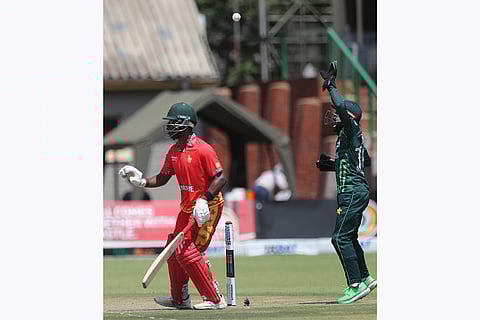 ZIM vs PAK 2nd ODI: Zimbabwe's Dion Myers, left, in front of Pakistan's wicket keeper Mohammad Rizwan