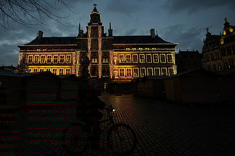 City Hall as it is lit up in orange in Antwerp, Belgium