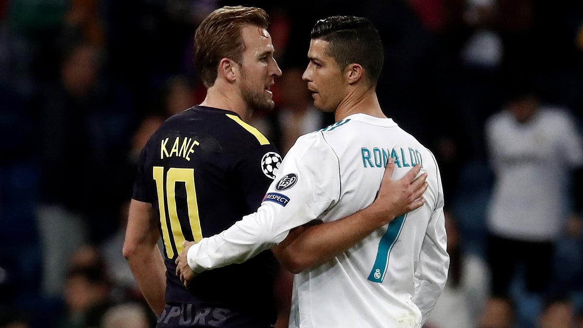 Harry Kane believes the influence of Cristiano Ronaldo and Lionel Messi has led to a decline of number nines in football - null