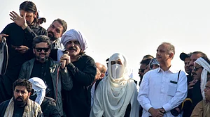 AP/W.K. Yousufzai : Imran Khan's wife Bushra Bibi, centre, and leaders of Khan's party lead their supporters during a rally demanding Khan's release in Islamabad.