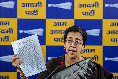 Atishi addresses a press conference