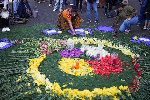 Flowers are placed on an altar in Guatemala City