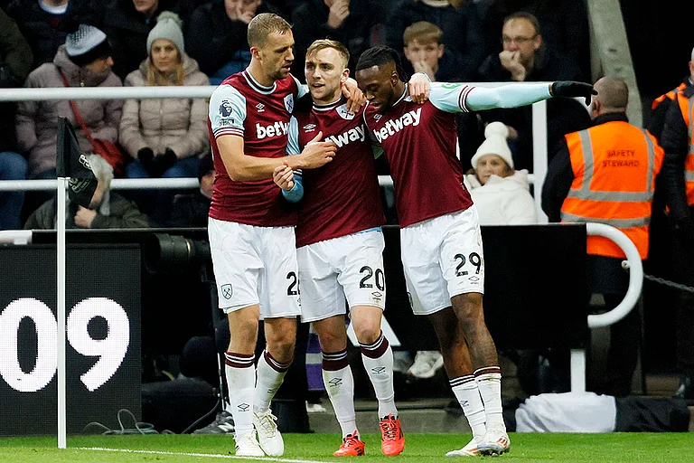EPL 2024-25: West Ham United's scorer Aaron Wan-Bissaka with Tomas Soucek, left, and Jarrod Bowen, center, celebrate their side's second goal - | Photo: Richard Sellers/PA via AP