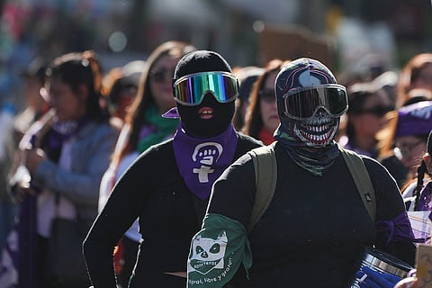 Demonstrators attend a march in Mexico City
