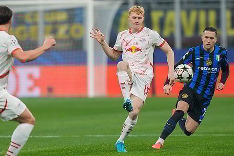 UEFA Champions League: Leipzig's Nicolas Seiwald challenges for the ball with Inter Milan's Piotr Zielinski