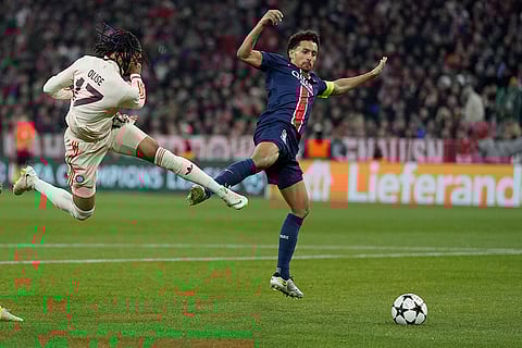 UEFA Champions League: PSG's Marquinhos, right, tries to block a shot from Bayern's Michael Olise