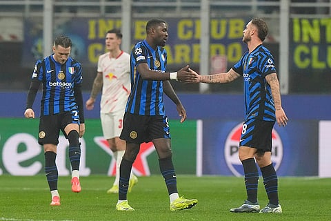 UEFA Champions League: Inter Milan's Marcus Thuram shakes hands with his teammate Marko Arnautovic after the end of the match