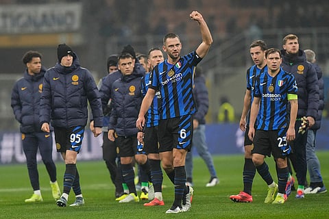 UEFA Champions League: Inter Milan's Stefan de Vrij, center, celebrates after the end of the match