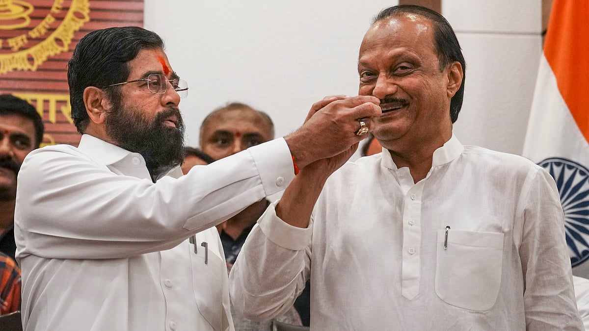 PTI : Maharashtra CM Eknath Shinde (L) with NCP Chief Ajit Pawar