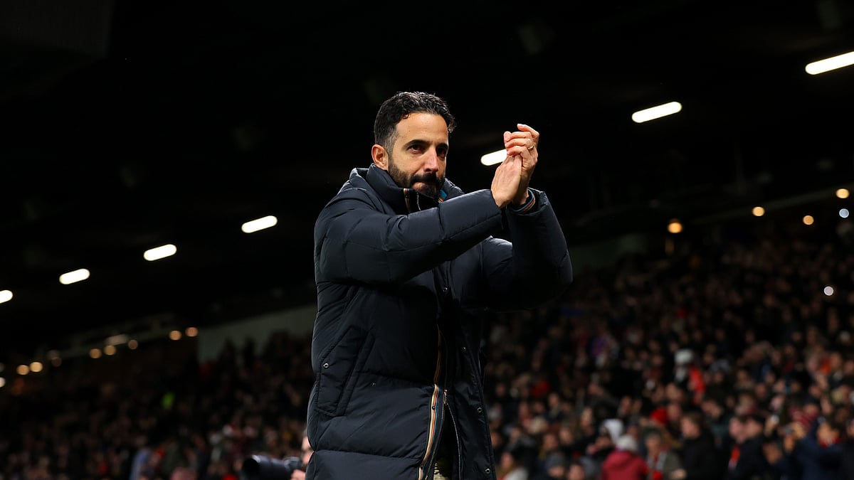 Ruben Amorim applauds the Manchester United fans