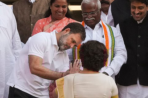 Rahul Gandhi takes pictures of Congress leader Priyanka Gandhi Vadra