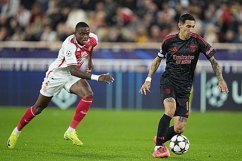 Champions League 2024-25: Benfica's Angel Di Maria, right, controls a ball chased by Monaco's Denis Zakaria