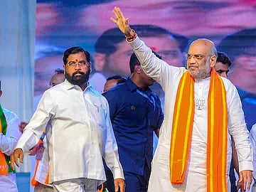 PTI : Outgoing Maharashtra CM Eknath Shinde with Union Home Minister Amit Shah 