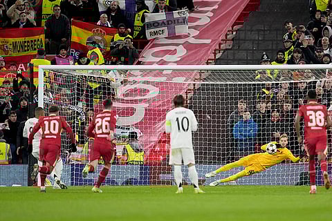Champions League 2024-25: Liverpool's goalkeeper Caoimhin Kelleher stops a penalty shot from Real Madrid's Kylian Mbappe