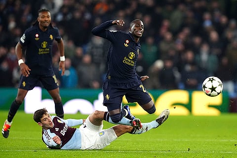 Champions League 2024-25: Aston Villa's Pau Torres, left, tackles Juventus' Timothy Weah