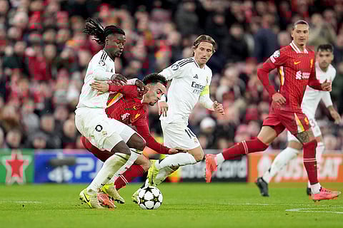 Champions League 2024-25: Liverpool's Curtis Jones vies for the ball with Real Madrid's Eduardo Camavinga