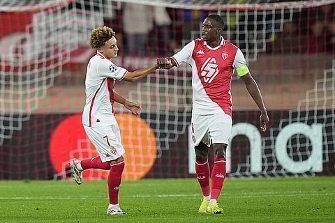 Champions League 2024-25: Monaco's Eliesse Ben Seghir, left, celebrates after scoring the opening goal against Benfica