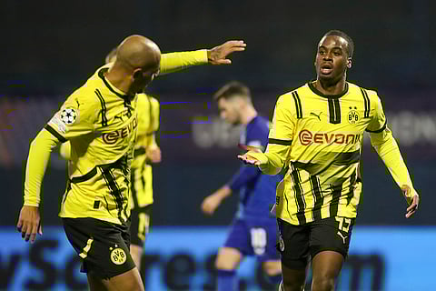 Champions League 2024-25: Dortmund's Jamie Bynoe-Gittens, right, celebrates after scoring his side's opening goal