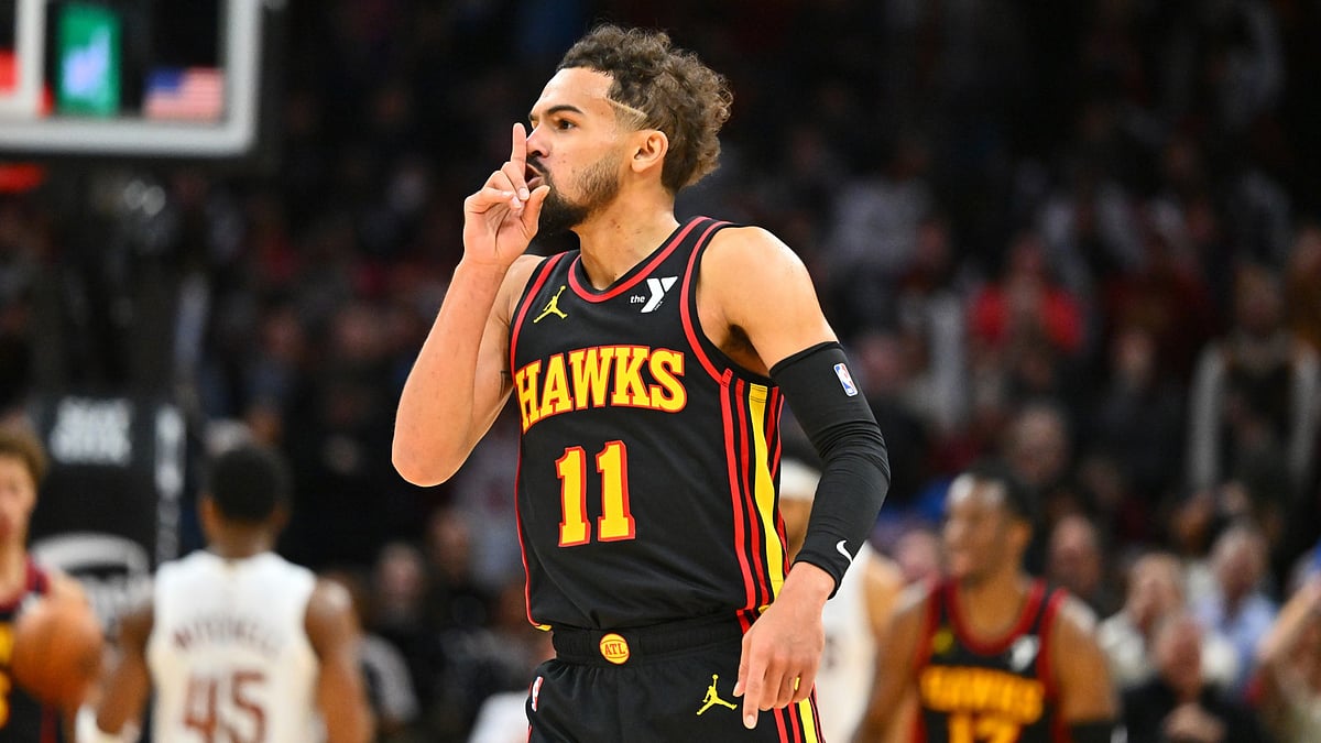Trae Young #11 of the Atlanta Hawks silences the crowd during the fourth quarter against the Cleveland Cavaliers at Rocket Mortgage Fieldhouse on November 27, 2024 in Cleveland, Ohio. The Hawks defeated the Cavaliers 135-124.