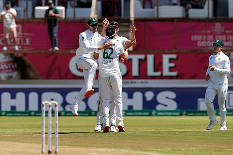 RSA Vs SL, 1st Test: South Africa's Tristan Stubbs, left, reacts with Gerald Coetzee after taking a wicket of Sri Lanka's Kamindu Mendis