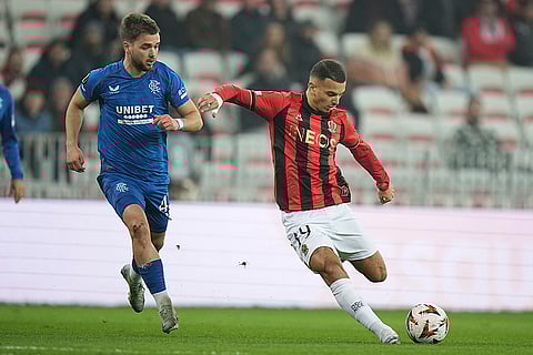 UEFA Europa League: Nice's Badredine Bouanani, right, controls a ball chased by Rangers' Nicolas Raskin