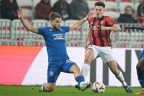 UEFA Europa League: Nice's Tom Louchet, right, and Rangers' Nicolas Raskin fight for the ball