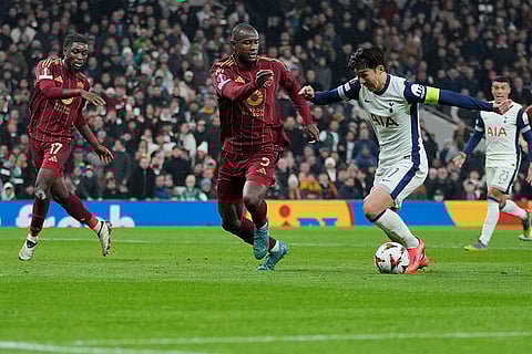 UEFA Europa League: Tottenham's Son Heung-min, right and Roma's Evan Ndicka vie for the ball