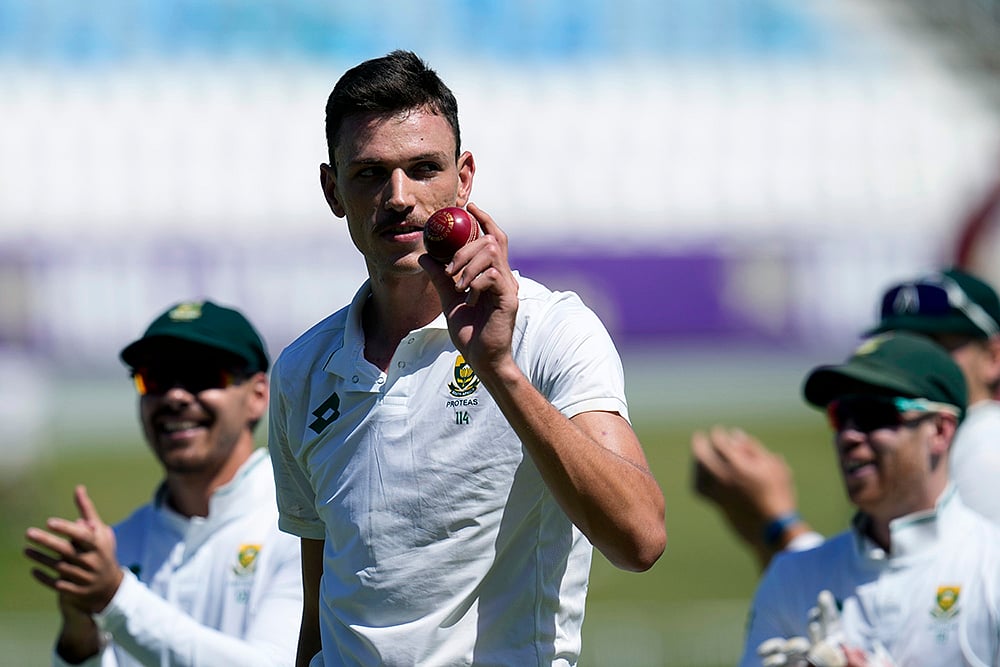 RSA Vs SL, 1st Test: South Africa's Marco Jansen leaves the field as he holds the ball after taking seven wickets  - | Photo: AP/Themba Hadebe