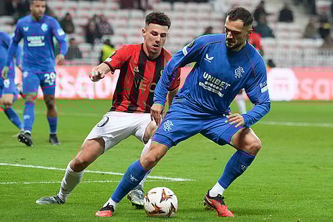 UEFA Europa League: Rangers' Nedim Bajrami, right, and Nice's Tom Louchet fight for the ball