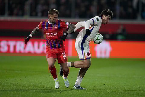 Europa Conference League: Heidenheim's Niklas Dorsch, left, and Chelsea's Marc Guiu in action