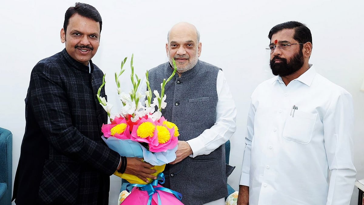 PTI : Union Minister and senior BJP leader Amit Shah, Maharashtra BJP leader Devendra Fadnavis, Shiv Sena leader Eknath Shinde exchange greetings during a meeting at Nadda's residence in New Delhi, Thursday, Nov. 28, 2024. 