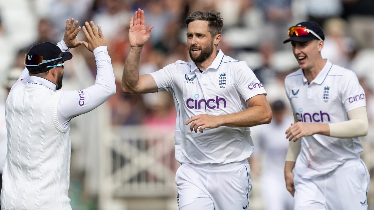 Chris Woakes took two consecutive wickets in Christchurch to put England on the brink of victory
