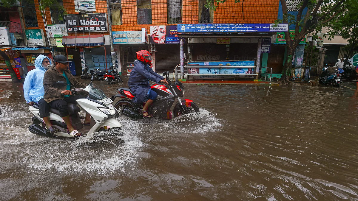 PTI : Vehicles move on a waterlogged road amid rain owing to Cyclone Fengal, in Chennai, Saturday, Nov. 30, 2024. 