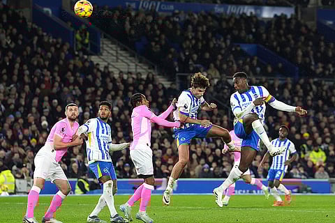 English Premier League: Brighton's Danny Welbeck, right, heads the ball