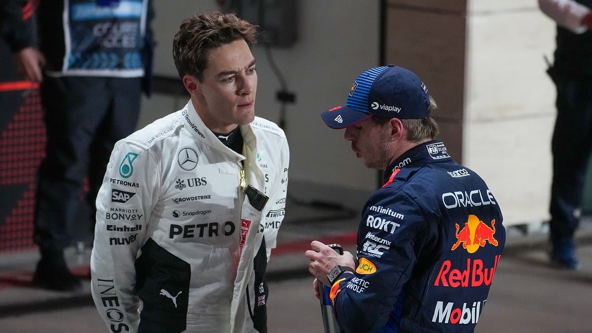 File Photo : Mercedes' George Russell with Red Bull's Max Verstappen