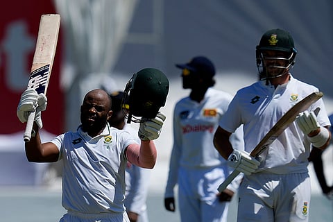 RSA Vs SL, 1st Test Day 3: South Africa's captain Temba Bavuma raises his bat after reaching his century