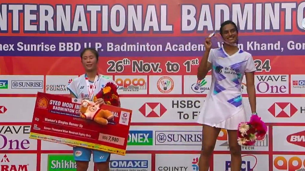 Screengrab DD Sports : PV Sinhdu at the podium of the Syed Modi International 2024. 