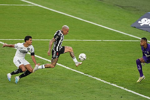 Copa Libertadores Final: Eduardo Vargas of Brazil's Atletico Mineiro kicks the ball