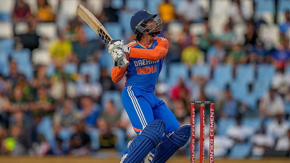 Tilak Varma belts Anrich Nortje out of the ground in the 1st T20I at the Baraspati Stadium in Cuttack. - | Photo: AP/Themba Hadebe