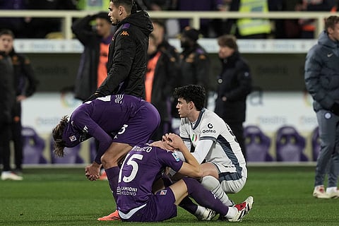 Serie A soccer: Players comfort each other as Fiorentina's Edoardo Bove, injured, is taken to hospital