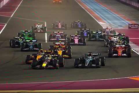 F1 Grand Prix of Qatar: Max Verstappen of the Netherlands and George Russell of Great Britain lead the field into turn 1