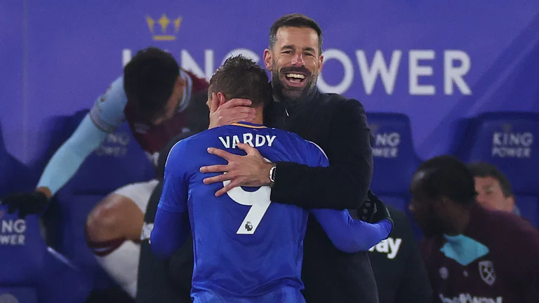 Ruud van Nistelrooy and Jamie Vardy celebrate against West Ham on Tuesday - null