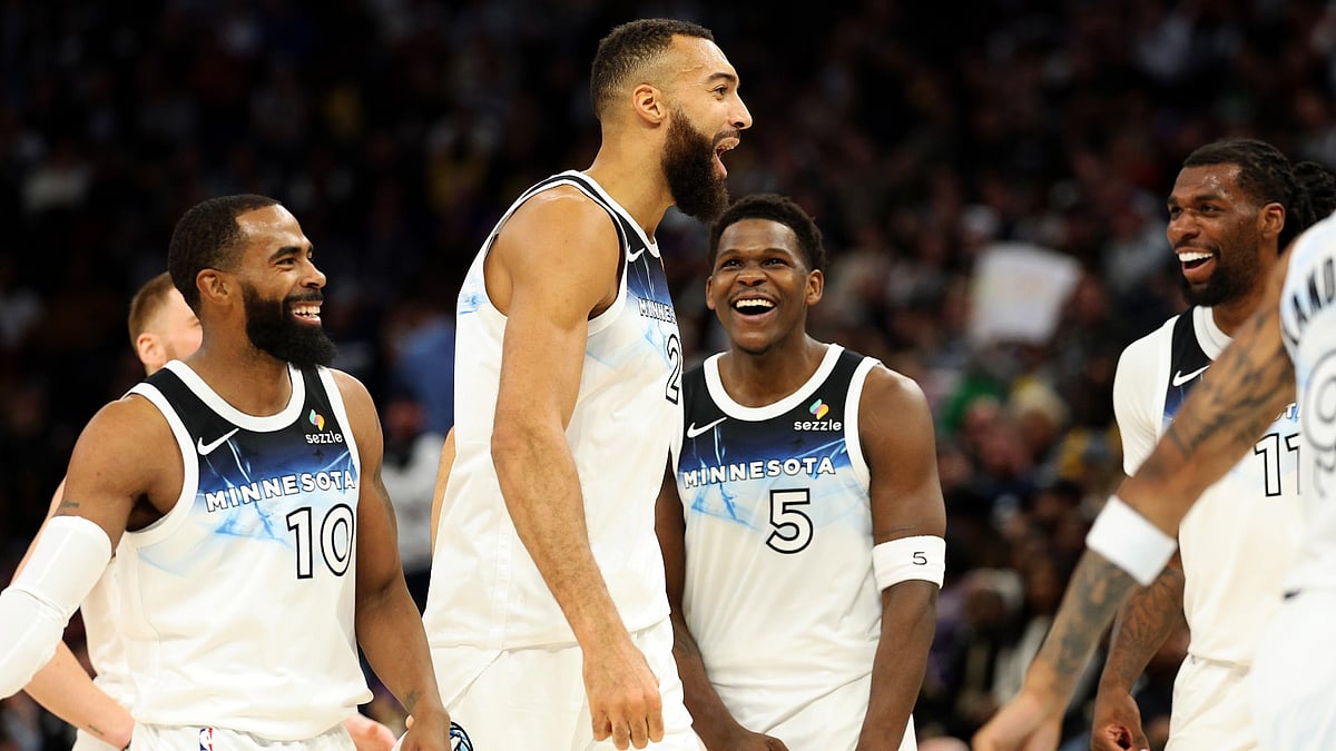 Minnesota Timberwolves players celebrate at a timeout during a win over the Los Angeles Lakers on Dec. 2, 2024.