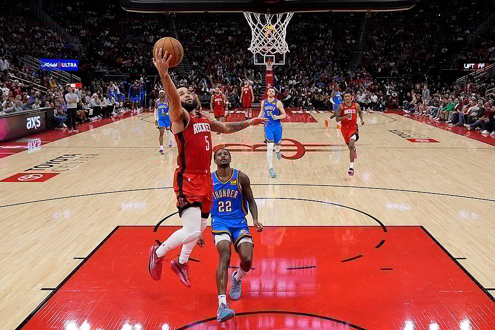 | Photo: AP/Ashley Landis : NBA: Rockets guard Fred VanVleet (5) shoots against Thunder guard Cason Wallace (22) 