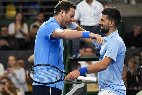 Juan Martin Del Porto Retires: Djokovic, right, embraces Juan Martin Del Potro