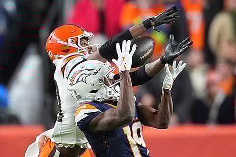 NFL: Broncos wide receiver Marvin Mims Jr. (19), defended by Browns cornerback Denzel Ward