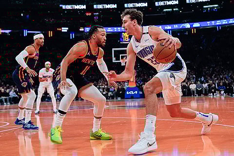 NBA Cup 2024: Magic forward Franz Wagner (22) dribbles past Knicks guard Jalen Brunson