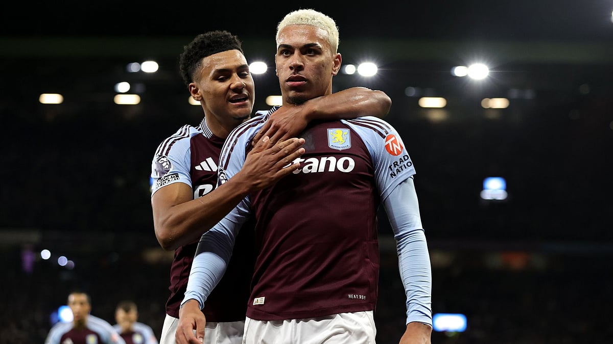 Rogers (right) and Watkins celebrate Villa's opener