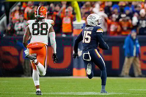 NFL: Broncos linebacker Nik Bonitto (15) picks off a pass intended for Browns tight end Jordan Akins